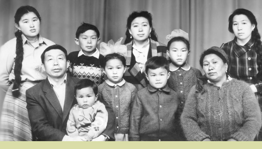 Beishenbai Berdibaev and his wife with eight of their children