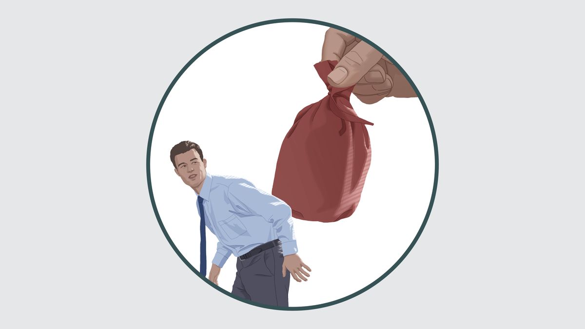 A hand lifting a large heavy sack off a brother’s shoulders.