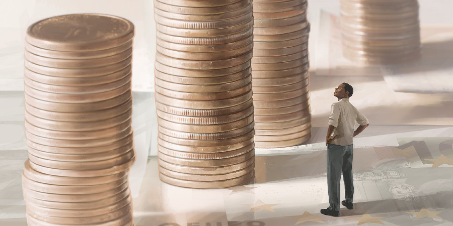 කාසි ගොඩවල් දිහා බලාගෙන ඉන්න මනුස්සයෙක්