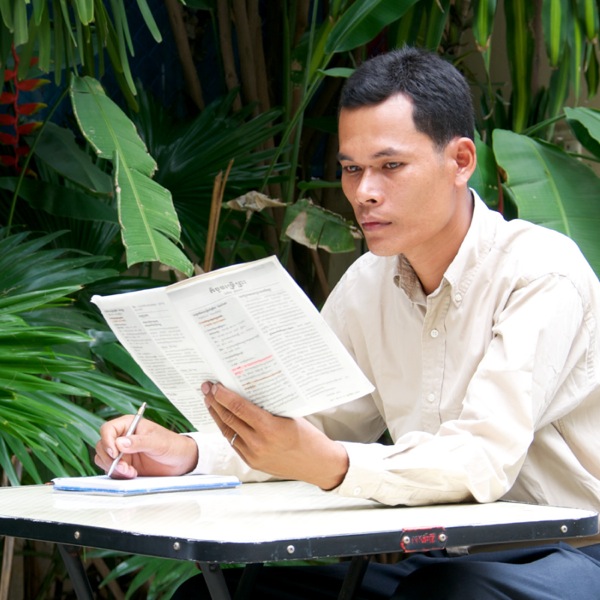 One of Jehovah’s Witnesses studying for a congregation meeting
