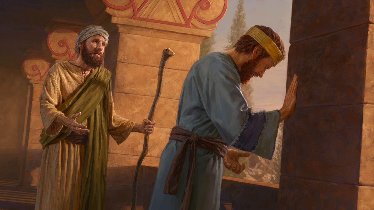 Profeten Natan pratar lugnt till David. David böjer sitt huvud och gråter bittert.