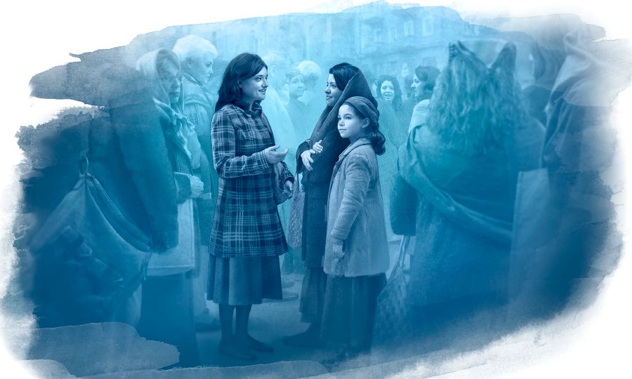 Ett Jehovas vittne predikar för människor som köar för att få bröd.