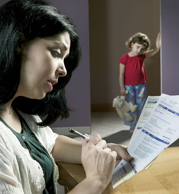A mother reviewing her finances