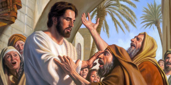 Jesús toca los ojos a un ciego y lo cura