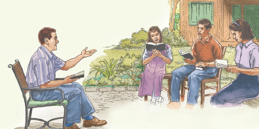Una familia leyendo la Biblia