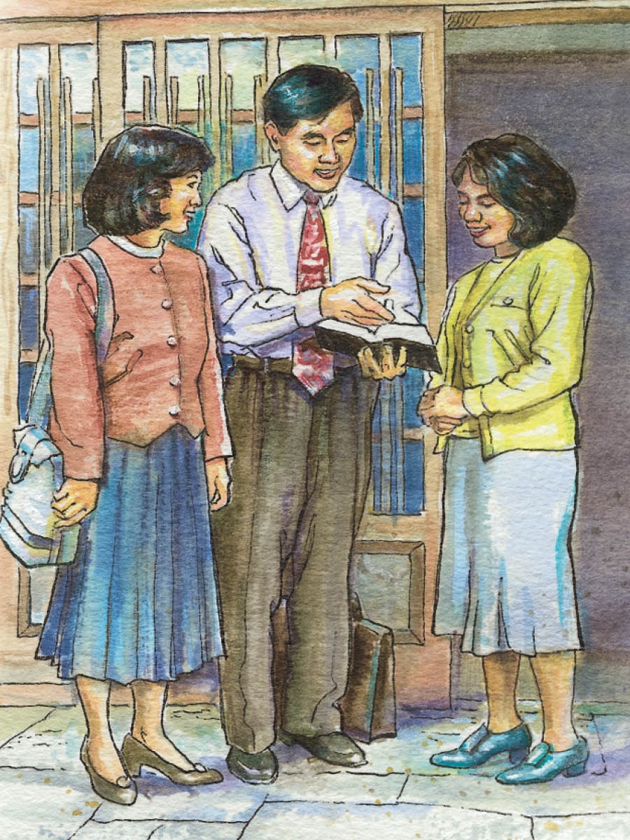 Dos testigos de Jehová predicándole a una mujer