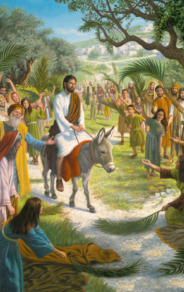 Yesu wakwera pa mbunda apo ŵanthu ŵali mumphepete mwa nthowa ŵakuwuska mahamba.