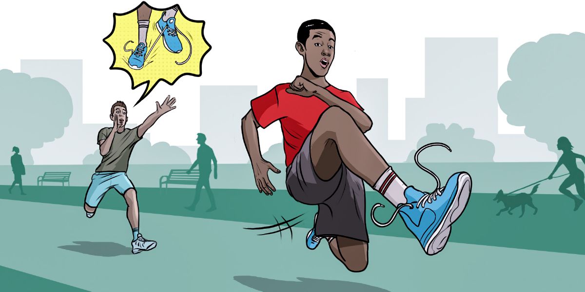 Một bạn nam nhắc bạn mình buộc dây giày để không bị ngã và chấn thương.