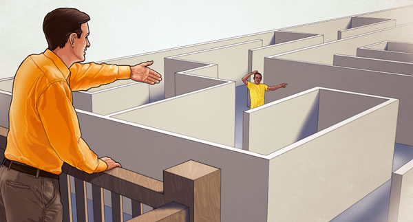 Một người lớn đang giúp em trẻ thoát khỏi mê cung