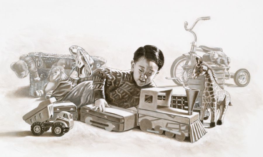 Một cậu bé chơi đồ chơi