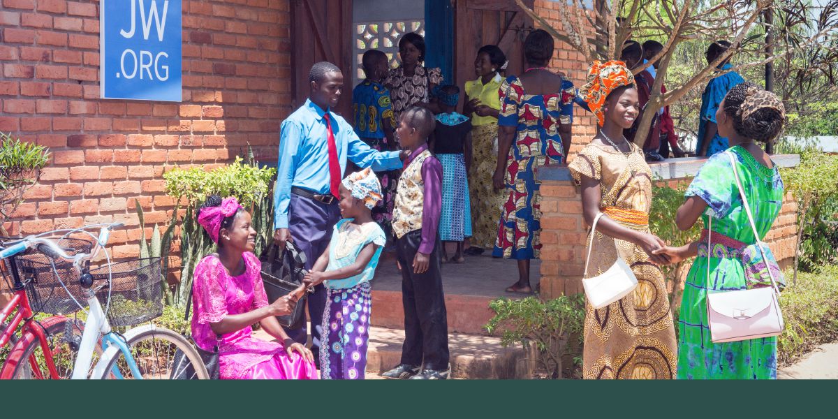Jehovah Witness people de greet each other for outside Kingdom Hall for Malawi