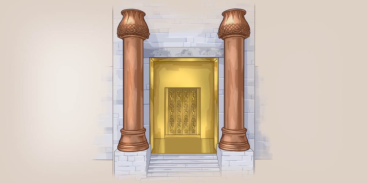 The two copper pillars wey dey front of the temple.