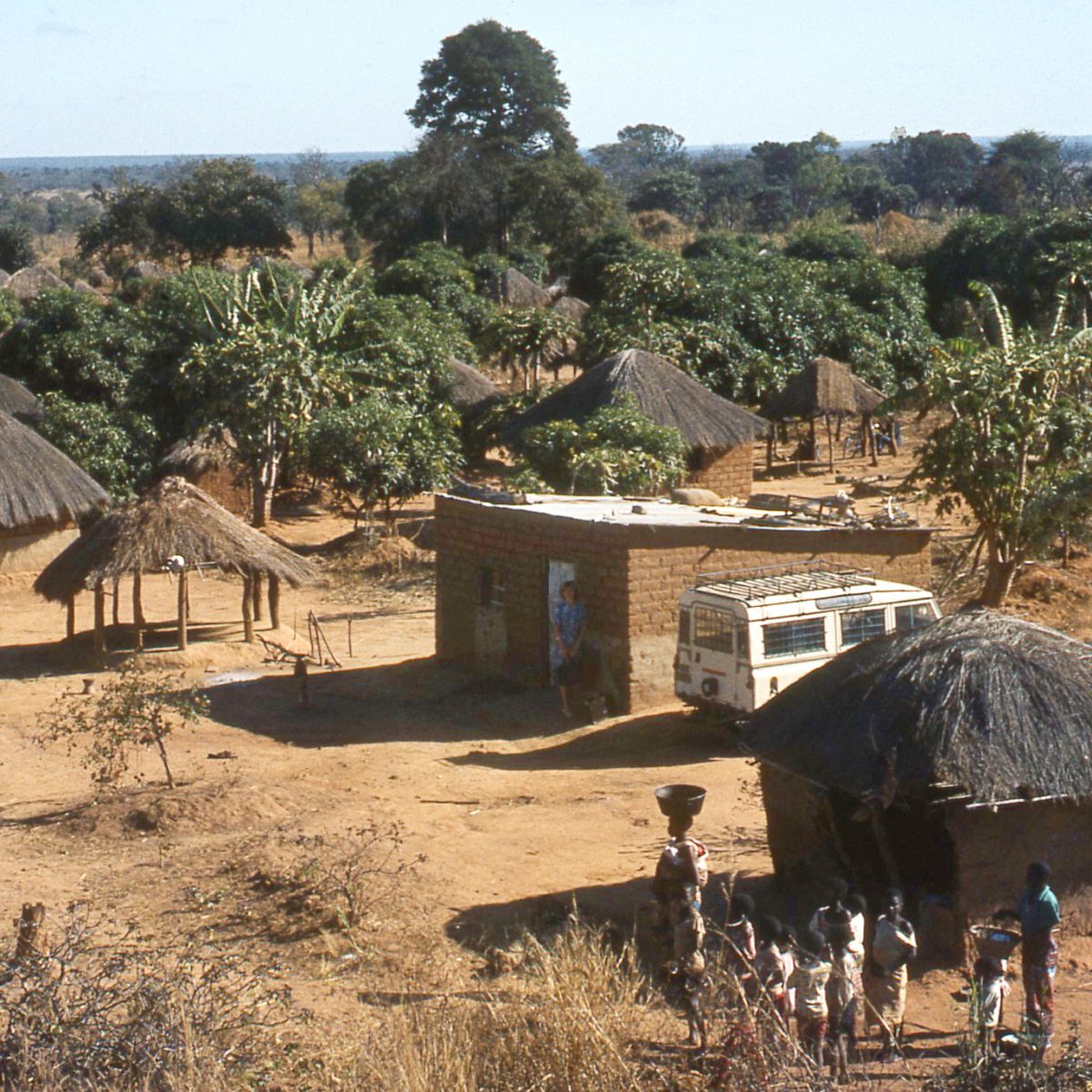 Sister Ann-Catrin stand for front of one house for one village for Zaire.
