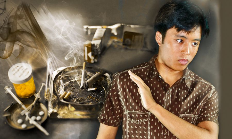 一个年轻男子拒绝沾染吸烟和滥用药物的不洁习惯
