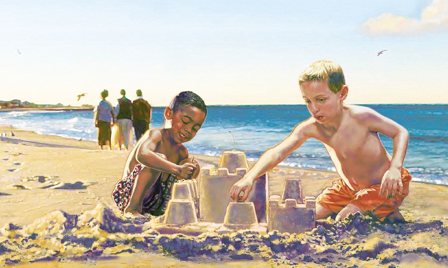 Dos niños de diferentes razas juegan juntos