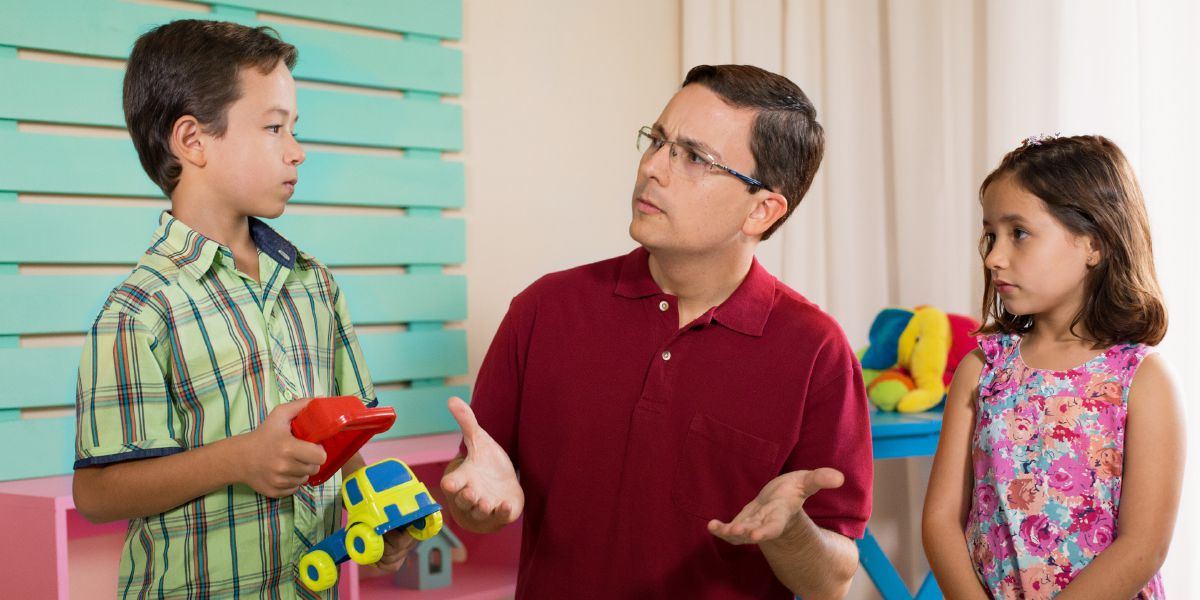 A father lovingly corrects his children