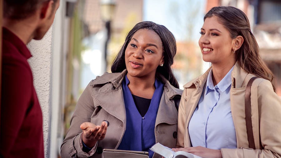Two sisters work together in the field ministry